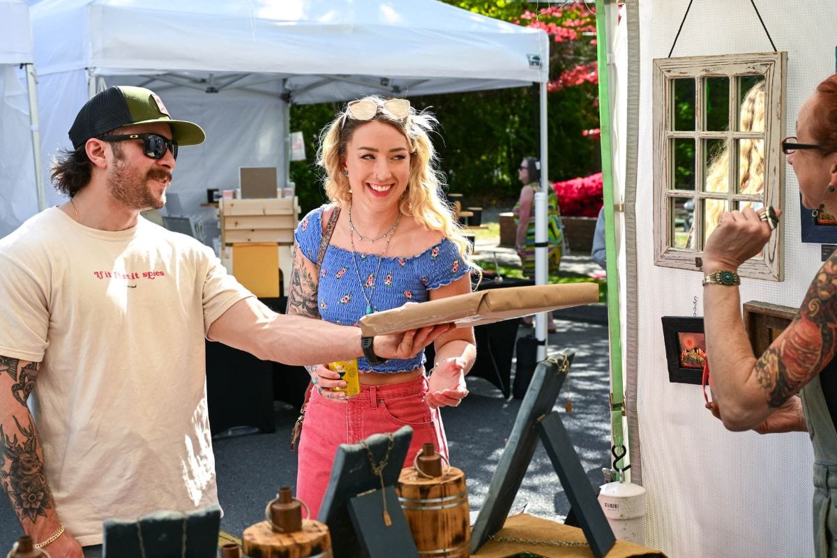 Visitors enjoying local vendors at Skagit Valley Tulip Festival.